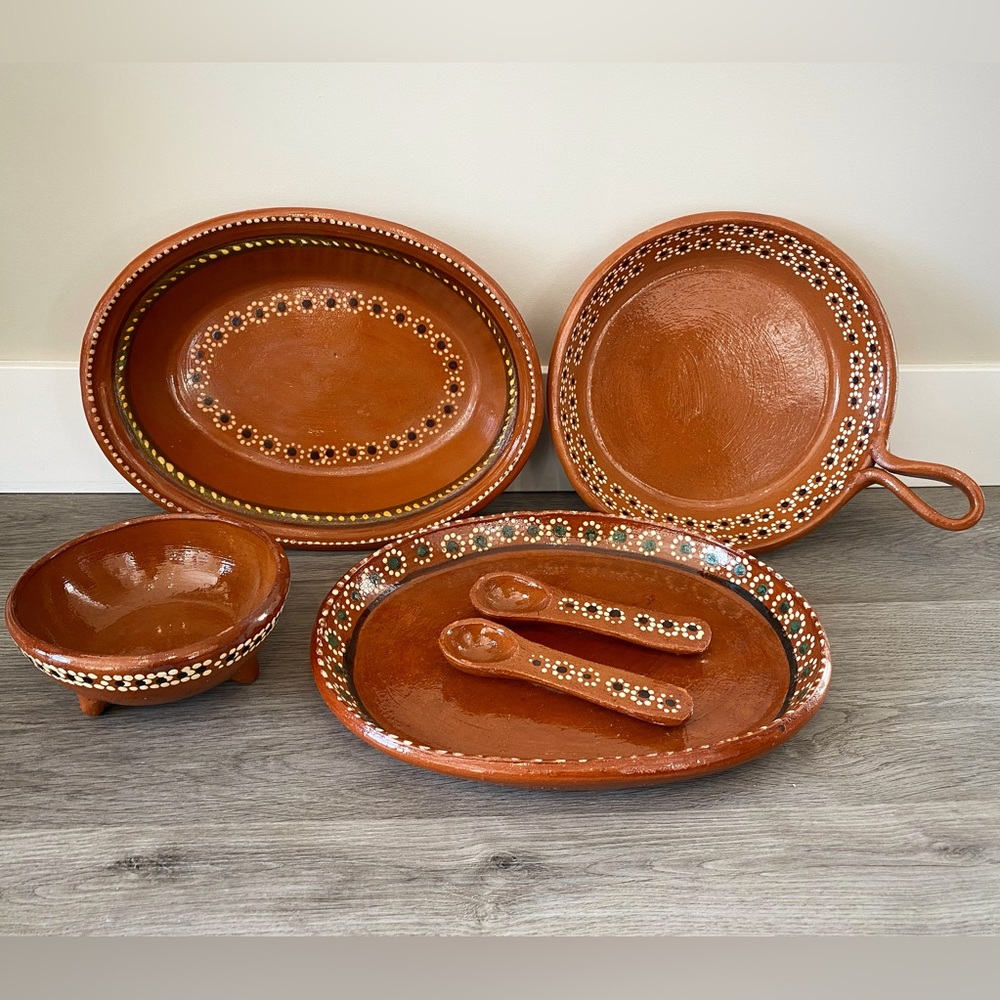 Incredible 6 piece ceramic dish set. Handmade with flower details.